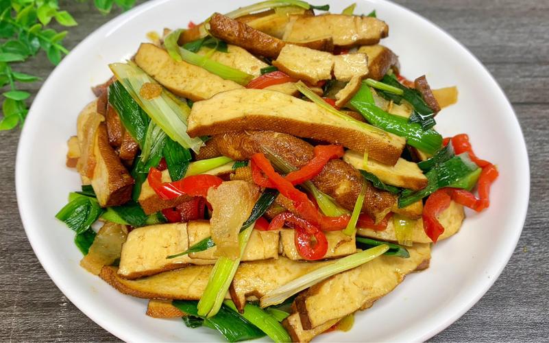 湘菜素炒蒜苗,舌尖上的乡愁，家常菜的韵味(湘菜素炒蒜苗图片高清) 湘菜素炒蒜苗,舌尖上的乡愁，家常菜的韵味(湘菜素炒蒜苗图片高清) 饮食拾萃